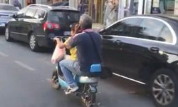 Motosikleti çocuğa kullandırıp telefonla konuştu