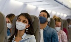 Dünya Sağlık Örgütü'nden yeniden maske çağrısı: Uçak yolculuklarında mutlaka takın