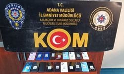 Adana'da rahlelerin içine gizlenmiş gümrük kaçağı 19 cep telefonu ele geçirildi