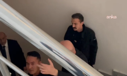 Örgüt liderliğiyle suçlanan Aktaş, korumalarla geldiği duruşmadan, hakim savcı kapısından ayrıldı