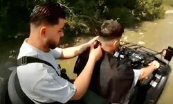 Manisalı berber traşta çığır açmaya devam ediyor. Bu kez de hızla giden ATV üzerinde traş yaptı