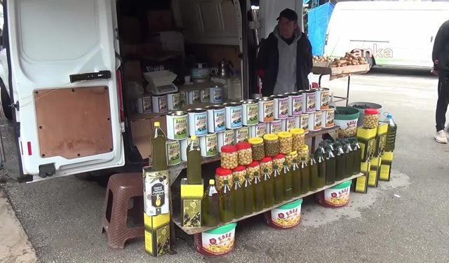 Zeytin satıcısı: "Günde 80 teneke zeytin satardık, şimdi 10 tenekeyi zor geçiyoruz"